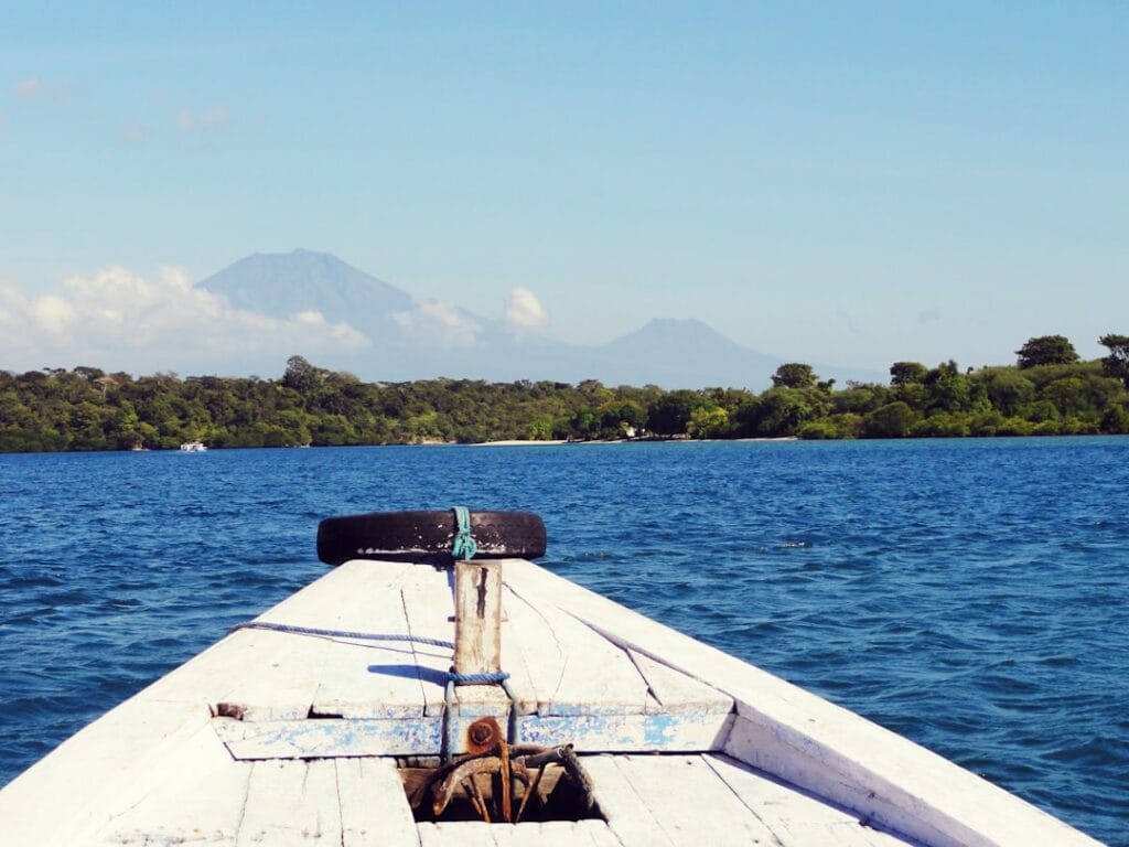 white-boat-on-sea-during-daytime-rpqlzzfwyeo